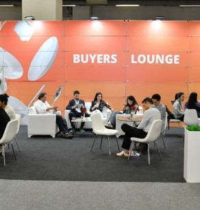 A group of buyers and visitors relaxing in the Buyers Lounge.