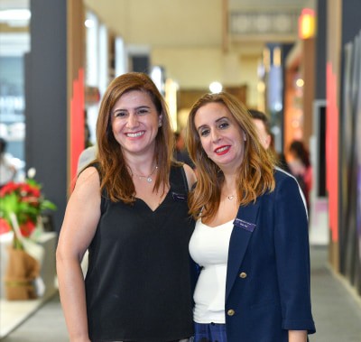 Marketing director & Marketing operations director walking around the fairground