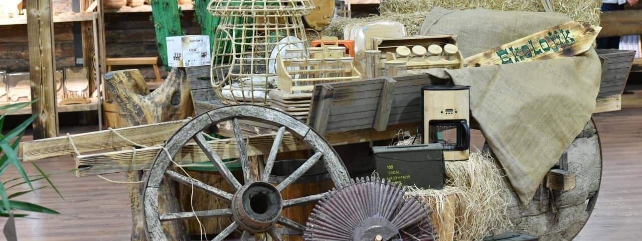 A decorative cart made of cactus, bamboo and recyclable natural materials with the word ecology written on it.